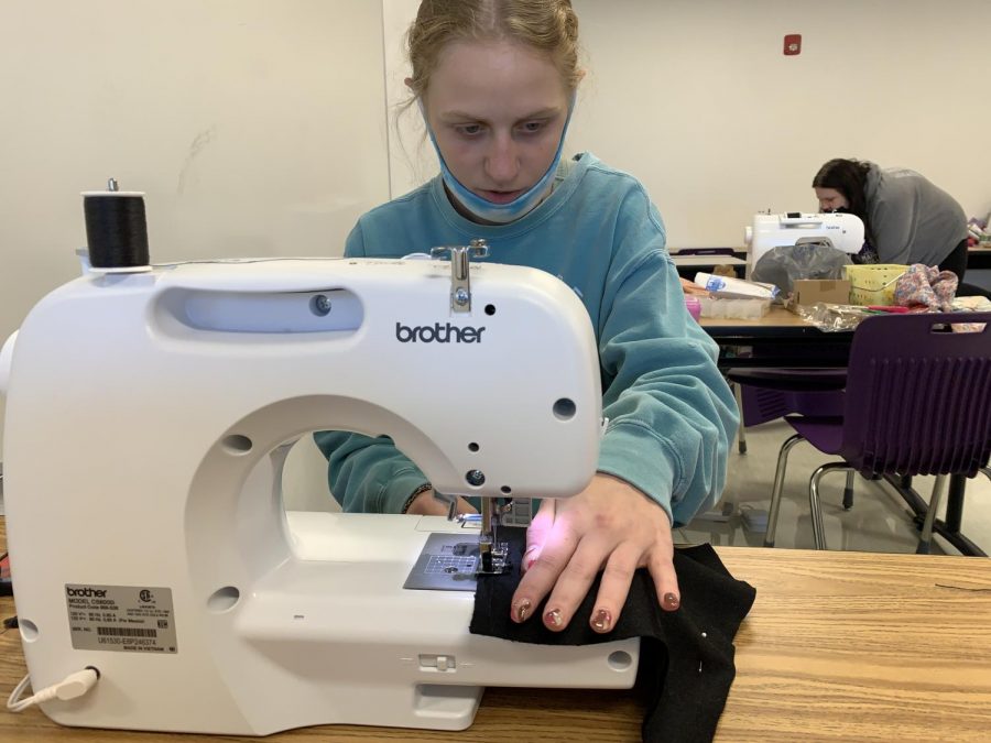 Senior Tyler Duffy uses the sewing machine.