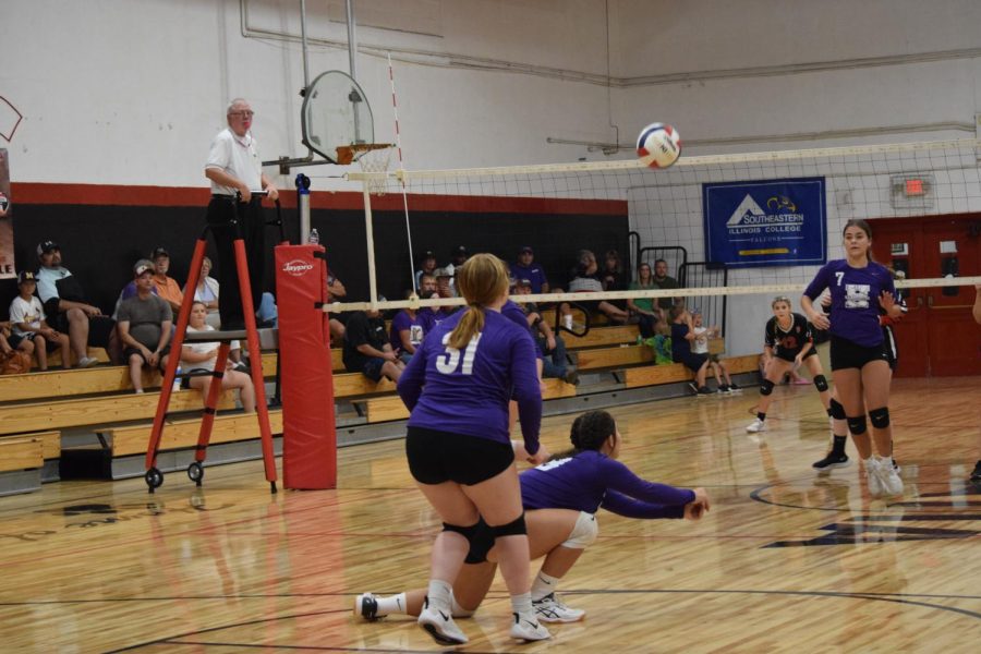 Sophomore Sara Butler goes to the ground to get a ball that was sent over by the Galatia Bearcats Sept. 14