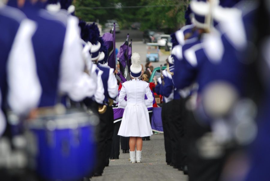 Junior Ali Hankins leads the parade as one of the Marching Bulldogs three drum majors. This is Hankins second year in the position. 