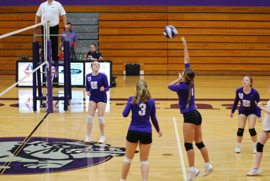 Sophomore Gabby Shires hits the ball towards the Benton Rangerettes in the jv game Sept 8. 