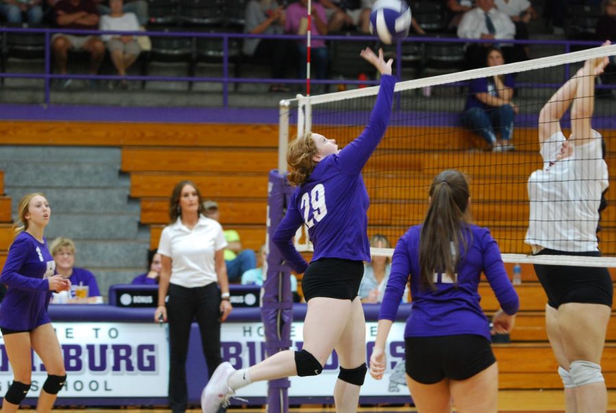 Sophomore Kaylee King tips the bsll over the net in the game against Benton Rangerettes in the Jv game Sept 8.