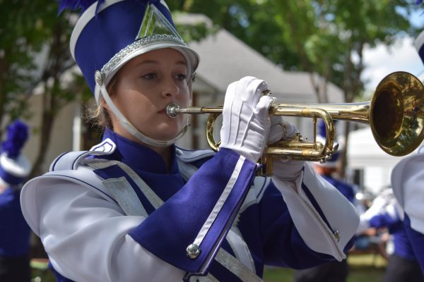 Freshman Kate Devisser performs with the Marching Bulldogs during the Popcorn Days parade. 