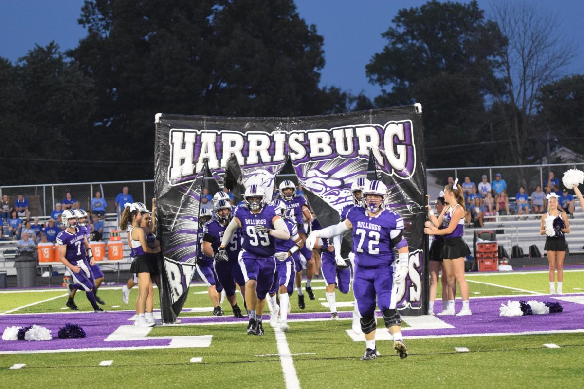 Bulldogs run out before the game against Anna-Jonesboro on Aug. 25. 