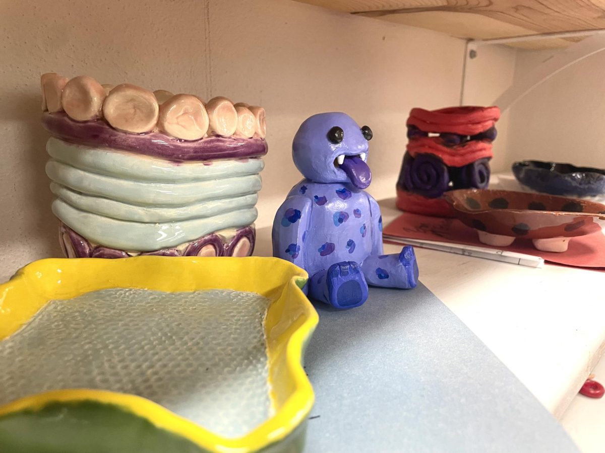 Display of ceramic pieces that sit on art teacher Emily Wallaces shelf. 