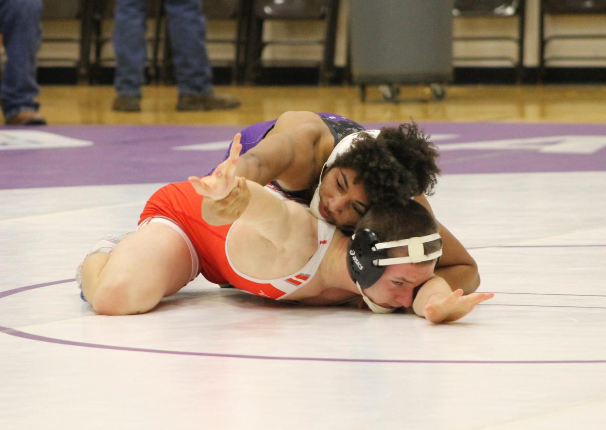 The HHS wrestling team faces off against West Frankfort and Benton at home. The Dogs had a double victory and celebrated graduating seniors.