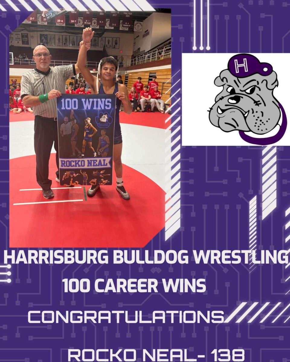 Senior Rocko Neal celebrates his 100th career win.