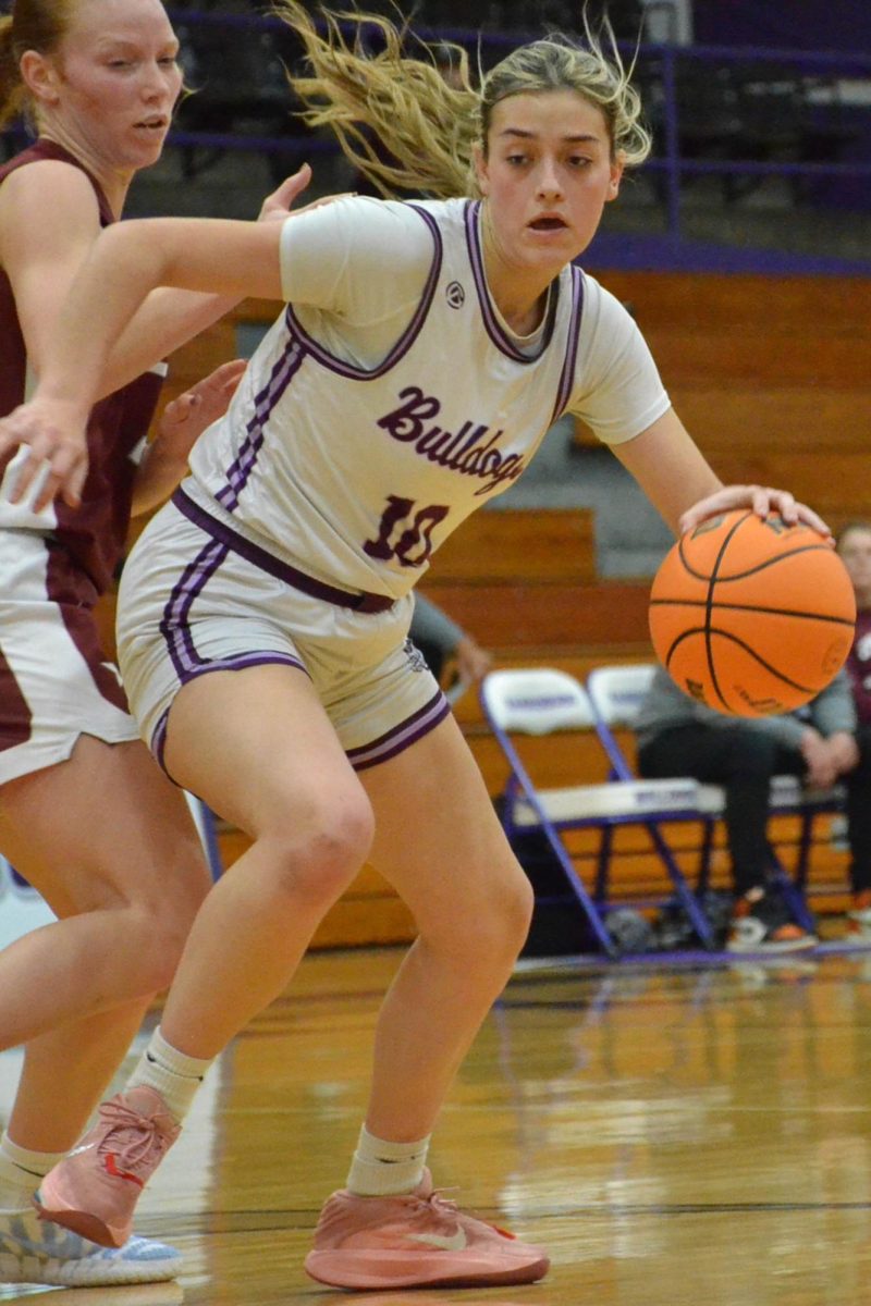 Junior Koral Hathaway goes up for the basket during a showdown against the Benton Rangers